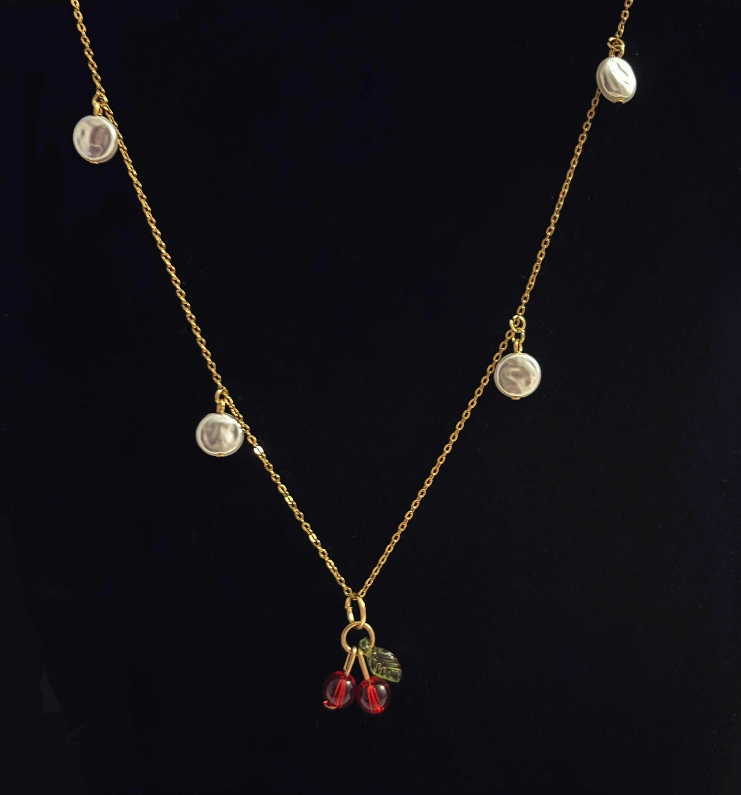 Cherry Bliss necklace in 18k gold-plated stainless steel with a close-up