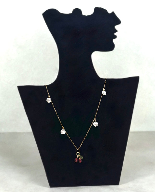 Cherry Bliss necklace in 18k gold-plated stainless steel on a white backround