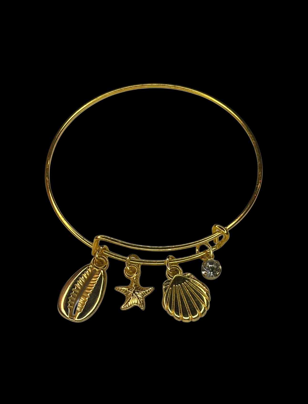 Salted gold Summer gold bracelet ajustable with shells on black backround