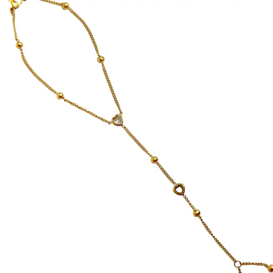 Gold hand chain with diamant heart on a white background